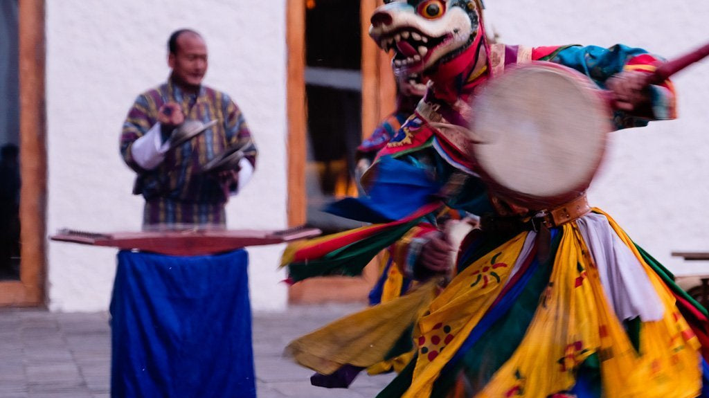 Traditional Bhutanese dance performance in winter